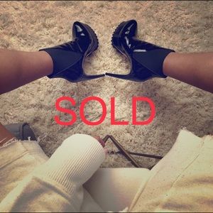 Patent leather ankle booties